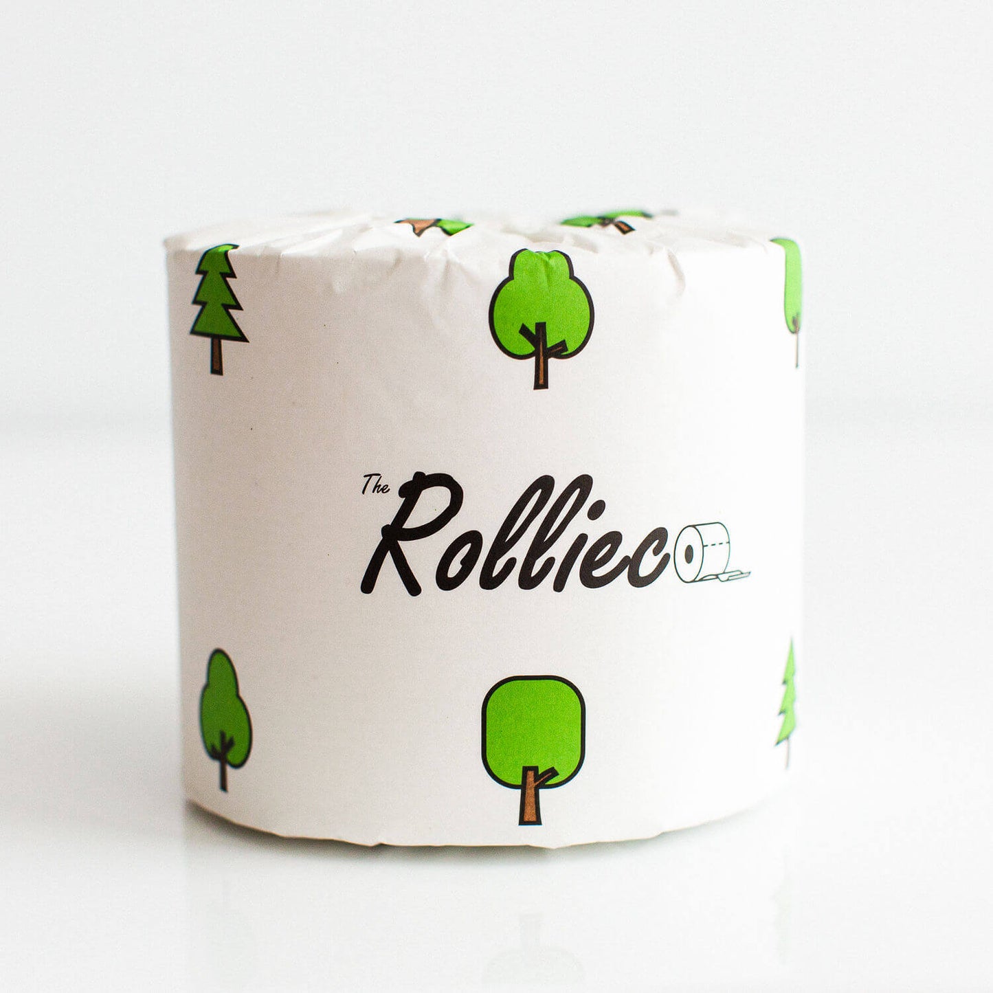 a roll of individually paper wrapped eco toilet paper branded The Rollieco. Wrapper is in white and cute trees design.