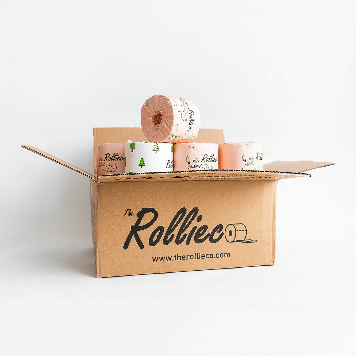 An opened carton box with rolls of individually paper wrapped eco toilet rolls showing. They are branded "the Rollieco"